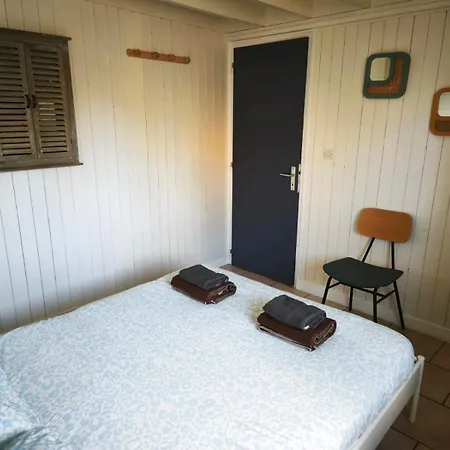 Prázdninový dům Pti Nel, Charmante Maison 100 M D 'asnelles 3 Chambres, Belle Piece De Vie, Au Coeur Des Plages Du Debarquement Proche Arromanches Et Bayeux , Jardin, Terrasse En Bois Amenagee, Parking Privatif, Commerces Et Restaurants A 10 Mn A Pied